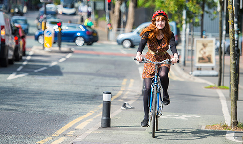Female student riding a bicycle
