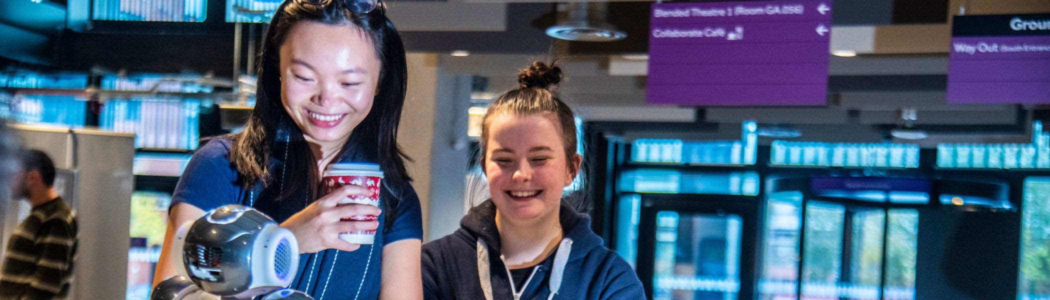 Two people engaged in conversation