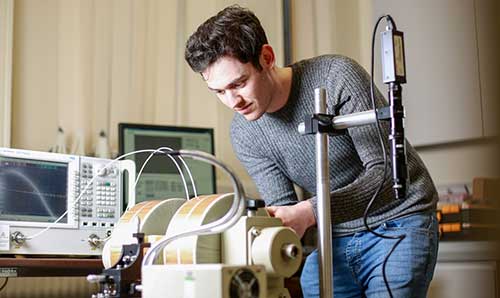 Person operating a spintronic device.