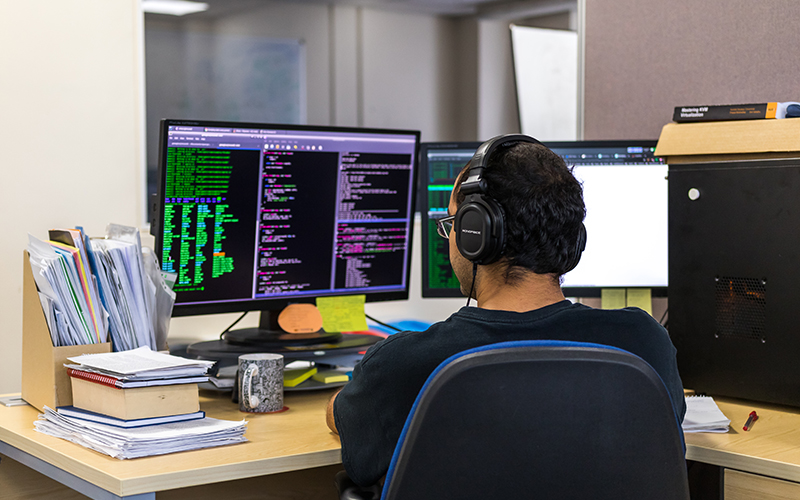 A student working at his computer station